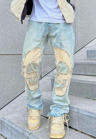Blue skulled jeans